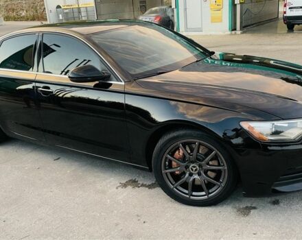 Черный Ауди А6, объемом двигателя 2 л и пробегом 165 тыс. км за 14600 $, фото 1 на Automoto.ua