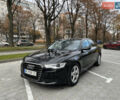 Чорний Ауді А6, об'ємом двигуна 2 л та пробігом 285 тис. км за 13999 $, фото 1 на Automoto.ua