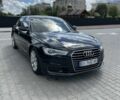 Черный Ауди А6, объемом двигателя 2 л и пробегом 270 тыс. км за 18199 $, фото 1 на Automoto.ua