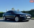 Чорний Ауді А6, об'ємом двигуна 1.98 л та пробігом 209 тис. км за 13499 $, фото 1 на Automoto.ua
