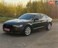 Черный Ауди А6, объемом двигателя 2 л и пробегом 280 тыс. км за 10500 $, фото 1 на Automoto.ua