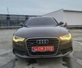 Черный Ауди А6, объемом двигателя 2 л и пробегом 185 тыс. км за 12600 $, фото 1 на Automoto.ua