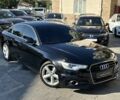 Черный Ауди А6, объемом двигателя 2 л и пробегом 180 тыс. км за 12909 $, фото 1 на Automoto.ua