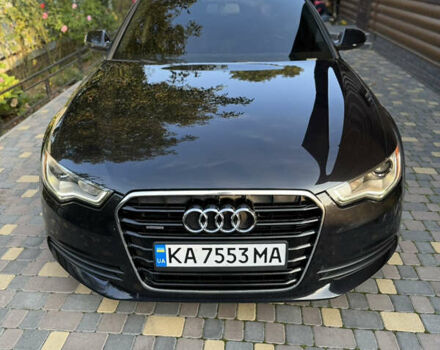 Черный Ауди А6, объемом двигателя 2 л и пробегом 175 тыс. км за 16900 $, фото 1 на Automoto.ua