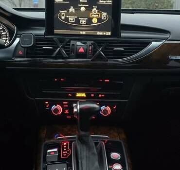 Ауді А6 2014 у Ужгороді на Automoto.ua Чорний Ауді А6, об'ємом двигуна 1.98 л та пробігом 272 тис. км за 13200 $, фото 10 на Automoto.ua