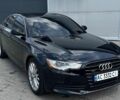 Черный Ауди А6, объемом двигателя 2 л и пробегом 220 тыс. км за 11900 $, фото 1 на Automoto.ua