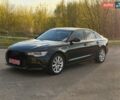 Черный Ауди А6, объемом двигателя 2 л и пробегом 285 тыс. км за 11950 $, фото 1 на Automoto.ua