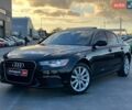 Черный Ауди А6, объемом двигателя 2 л и пробегом 214 тыс. км за 12940 $, фото 1 на Automoto.ua
