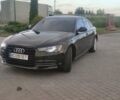 Черный Ауди А6, объемом двигателя 2 л и пробегом 183 тыс. км за 18500 $, фото 1 на Automoto.ua
