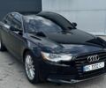 Черный Ауди А6, объемом двигателя 2 л и пробегом 220 тыс. км за 11900 $, фото 1 на Automoto.ua