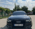 Черный Ауди А6, объемом двигателя 1.98 л и пробегом 170 тыс. км за 15500 $, фото 1 на Automoto.ua