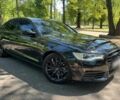 Черный Ауди А6, объемом двигателя 2 л и пробегом 216 тыс. км за 17300 $, фото 1 на Automoto.ua