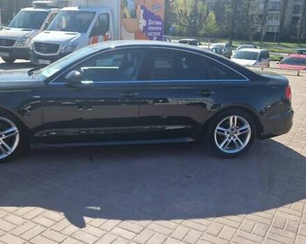 Черный Ауди А6, объемом двигателя 1.97 л и пробегом 244 тыс. км за 17500 $, фото 1 на Automoto.ua