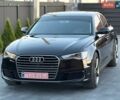 Черный Ауди А6, объемом двигателя 2 л и пробегом 225 тыс. км за 18900 $, фото 1 на Automoto.ua
