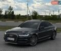 Черный Ауди А6, объемом двигателя 1.98 л и пробегом 167 тыс. км за 15800 $, фото 1 на Automoto.ua