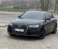 Чорний Ауді А6, об'ємом двигуна 1.98 л та пробігом 190 тис. км за 16900 $, фото 1 на Automoto.ua