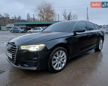 Черный Ауди А6, объемом двигателя 2 л и пробегом 241 тыс. км за 17200 $, фото 1 на Automoto.ua