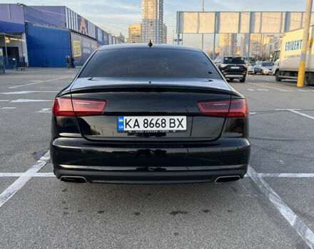 Черный Ауди А6, объемом двигателя 1.8 л и пробегом 230 тыс. км за 17000 $, фото 1 на Automoto.ua