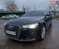 Черный Ауди А6, объемом двигателя 2 л и пробегом 241 тыс. км за 17200 $, фото 1 на Automoto.ua
