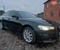 Черный Ауди А6, объемом двигателя 2 л и пробегом 247 тыс. км за 16700 $, фото 1 на Automoto.ua