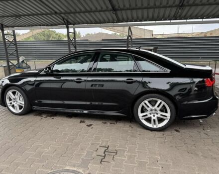 Черный Ауди А6, объемом двигателя 2 л и пробегом 120 тыс. км за 17500 $, фото 2 на Automoto.ua
