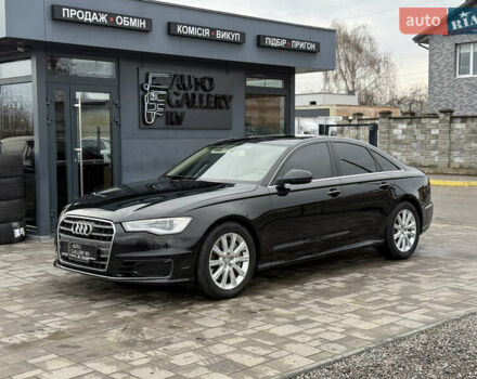 Черный Ауди А6, объемом двигателя 2 л и пробегом 173 тыс. км за 16988 $, фото 1 на Automoto.ua