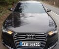 Черный Ауди А6, объемом двигателя 2 л и пробегом 317 тыс. км за 18900 $, фото 1 на Automoto.ua