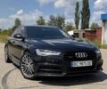 Черный Ауди А6, объемом двигателя 1.98 л и пробегом 118 тыс. км за 17300 $, фото 1 на Automoto.ua