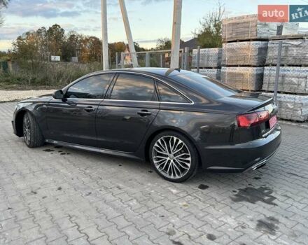 Черный Ауди А6, объемом двигателя 1.98 л и пробегом 161 тыс. км за 15900 $, фото 1 на Automoto.ua