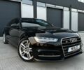 Черный Ауди А6, объемом двигателя 2 л и пробегом 205 тыс. км за 17700 $, фото 1 на Automoto.ua