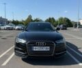 Черный Ауди А6, объемом двигателя 1.98 л и пробегом 165 тыс. км за 23900 $, фото 1 на Automoto.ua