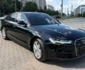 Черный Ауди А6, объемом двигателя 1.97 л и пробегом 244 тыс. км за 19200 $, фото 1 на Automoto.ua