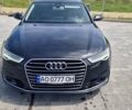 Черный Ауди А6, объемом двигателя 2 л и пробегом 260 тыс. км за 20500 $, фото 1 на Automoto.ua