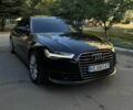 Черный Ауди А6, объемом двигателя 2 л и пробегом 165 тыс. км за 19999 $, фото 1 на Automoto.ua