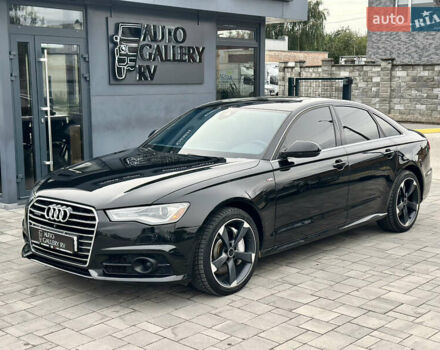 Черный Ауди А6, объемом двигателя 2 л и пробегом 132 тыс. км за 17988 $, фото 1 на Automoto.ua