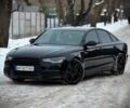 Черный Ауди А6, объемом двигателя 1.98 л и пробегом 210 тыс. км за 13700 $, фото 1 на Automoto.ua