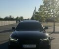 Черный Ауди А6, объемом двигателя 2 л и пробегом 265 тыс. км за 15533 $, фото 1 на Automoto.ua