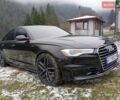 Черный Ауди А6, объемом двигателя 2 л и пробегом 300 тыс. км за 15200 $, фото 1 на Automoto.ua