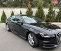 Чорний Ауді А6, об'ємом двигуна 2 л та пробігом 136 тис. км за 17700 $, фото 1 на Automoto.ua
