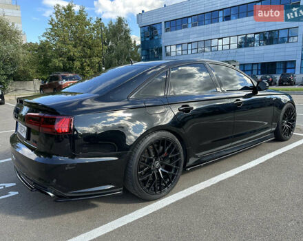 Черный Ауди А6, объемом двигателя 3 л и пробегом 125 тыс. км за 22500 $, фото 1 на Automoto.ua