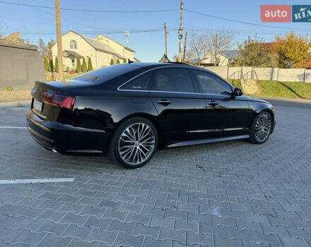 Ауді А6 2015 у Чернівцях на Automoto.ua Чорний Ауді А6, об'ємом двигуна 1.98 л та пробігом 160 тис. км за 19700 $, фото 5 на Automoto.ua