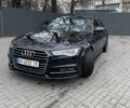 Черный Ауди А6, объемом двигателя 1.98 л и пробегом 165 тыс. км за 14400 $, фото 1 на Automoto.ua