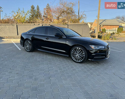 Ауді А6 2015 у Чернівцях на Automoto.ua Чорний Ауді А6, об'ємом двигуна 1.98 л та пробігом 160 тис. км за 19700 $, фото 3 на Automoto.ua