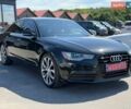Черный Ауди А6, объемом двигателя 2 л и пробегом 214 тыс. км за 15399 $, фото 1 на Automoto.ua