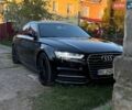 Черный Ауди А6, объемом двигателя 1.98 л и пробегом 209 тыс. км за 10900 $, фото 1 на Automoto.ua
