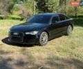 Черный Ауди А6, объемом двигателя 1.98 л и пробегом 136 тыс. км за 15500 $, фото 1 на Automoto.ua