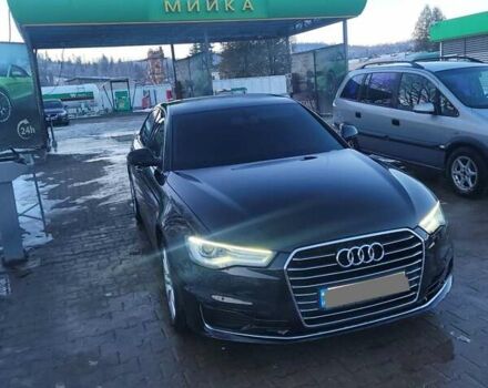 Черный Ауди А6, объемом двигателя 2 л и пробегом 229 тыс. км за 21999 $, фото 1 на Automoto.ua