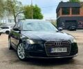 Черный Ауди А6, объемом двигателя 2 л и пробегом 144 тыс. км за 16500 $, фото 1 на Automoto.ua