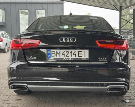 Черный Ауди А6, объемом двигателя 2 л и пробегом 120 тыс. км за 17500 $, фото 1 на Automoto.ua