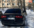 Черный Ауди А6, объемом двигателя 2 л и пробегом 175 тыс. км за 15300 $, фото 1 на Automoto.ua